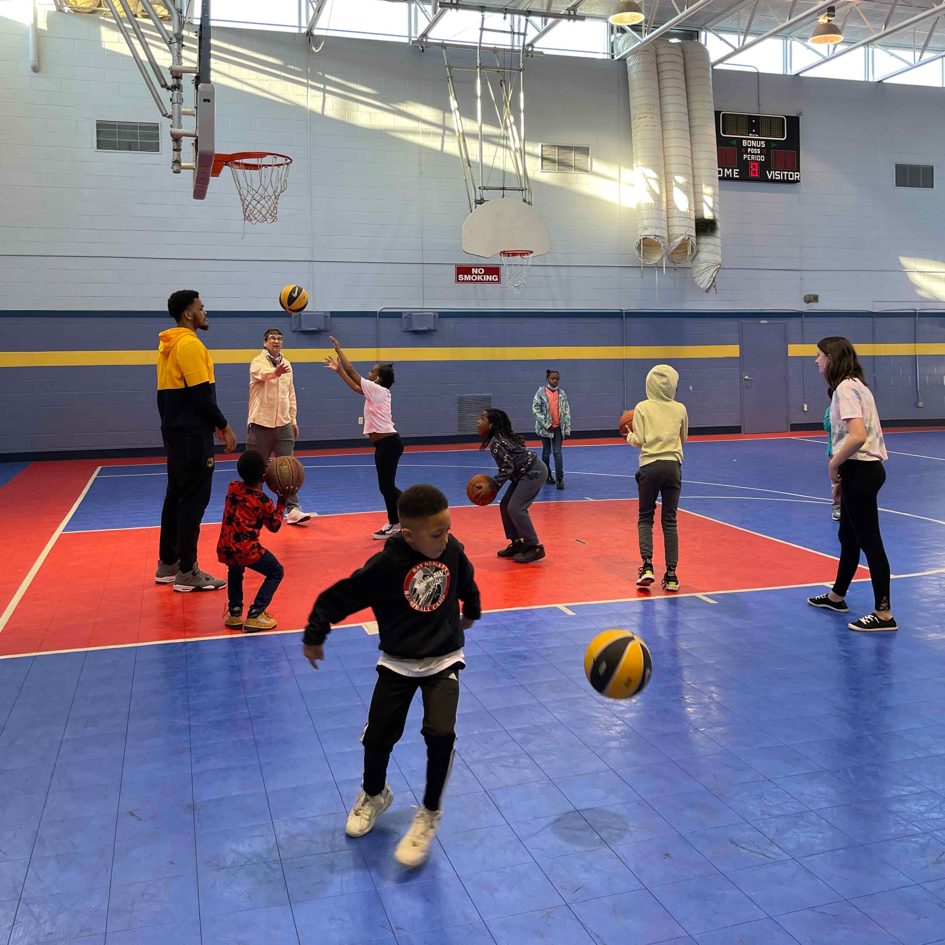 Synergy Technical and kids playing basketball