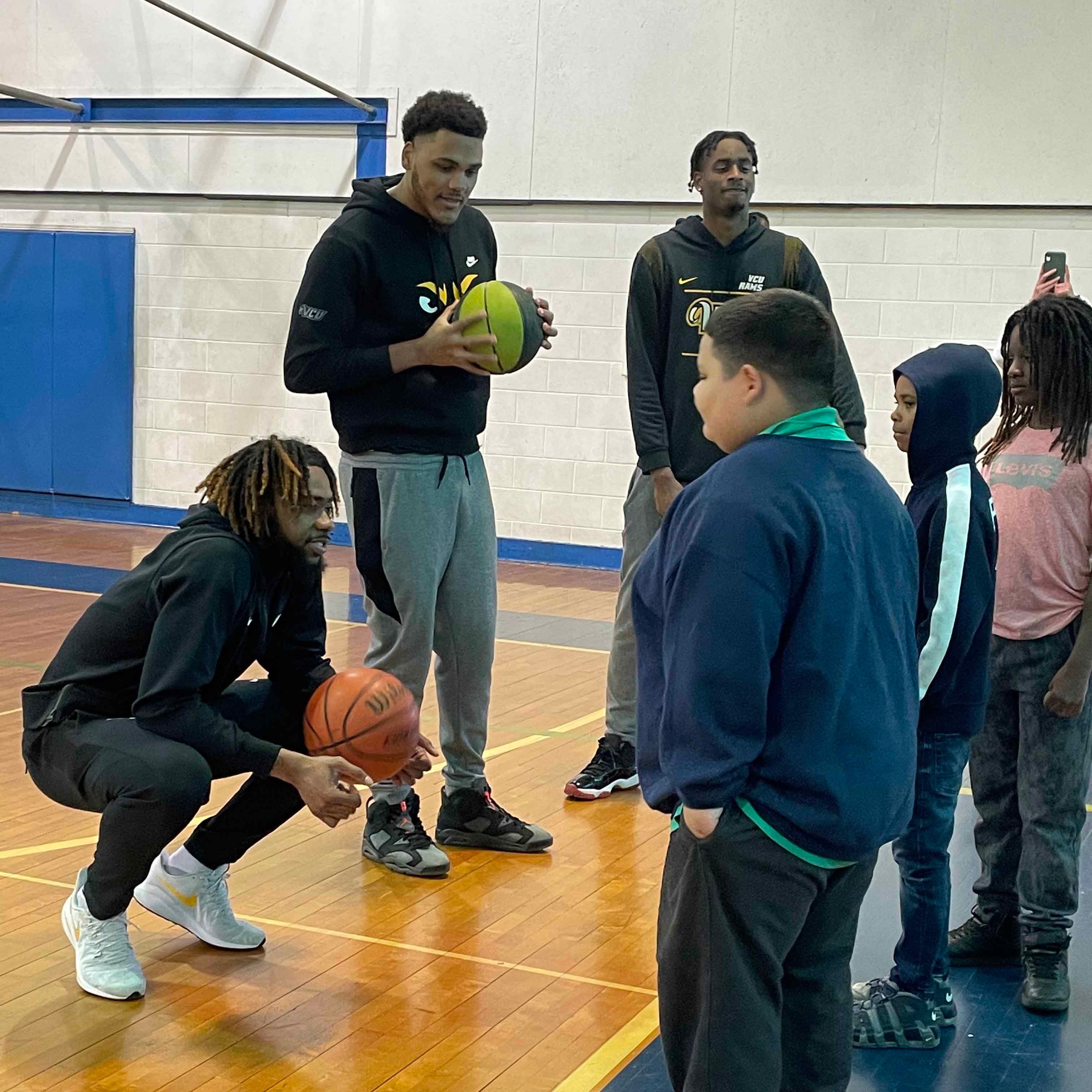 Synergy Technical and kids playing basketball