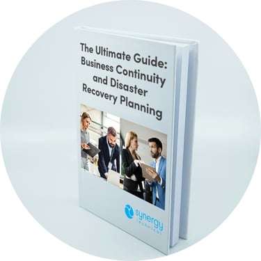 A digital booklet titled The Ultimate Guide: Business Continuity and Disaster Recovery displayed on a screen, symbolizing expert guidance and strategic planning resources.