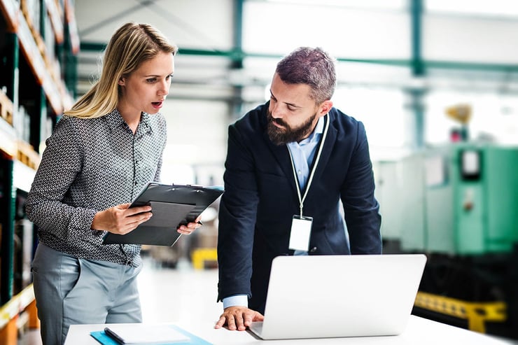 The IT director and his colleague collaborate to map out a continuity plan that protects both digital infrastructure and physical operations.