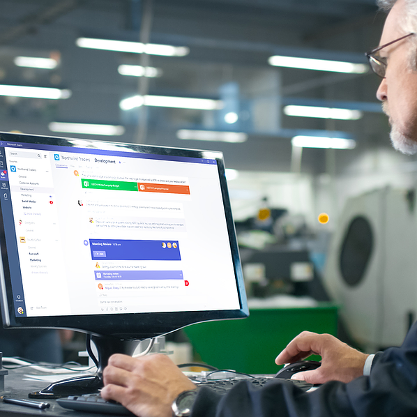 Picture of employee using Microsoft Teams to share files, coauthor, and edit content simultaneously and automatically save everyone’s changes and ideate together in the Microsoft Whiteboard app