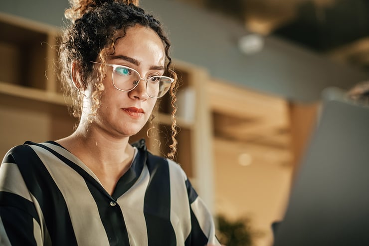 When an employee logs in after a company rebrand, her email, Teams, and SharePoint experience remain seamless, helping the organization avoid disruption and support spikes.