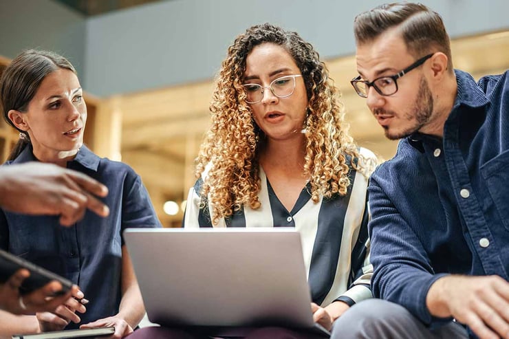 As daily work continues uninterrupted, an employee benefits from a structured Microsoft 365 rebrand that protects security, access, and familiar file locations.