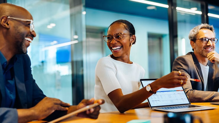 An employee presents insights generated with Microsoft Copilot Cowork, demonstrating how AI can accelerate data analysis and decision-making.