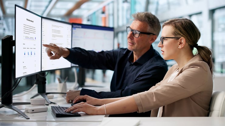 An IT administrator trains employees on Microsoft Copilot Cowork best practices to encourage secure and effective AI adoption.
