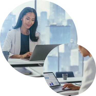 A female employee builds charts and graphs on her laptop using Windows 365, allowing her to work within a familiar Cloud PC environment that keeps her settings, files, and applications available from virtually anywhere.