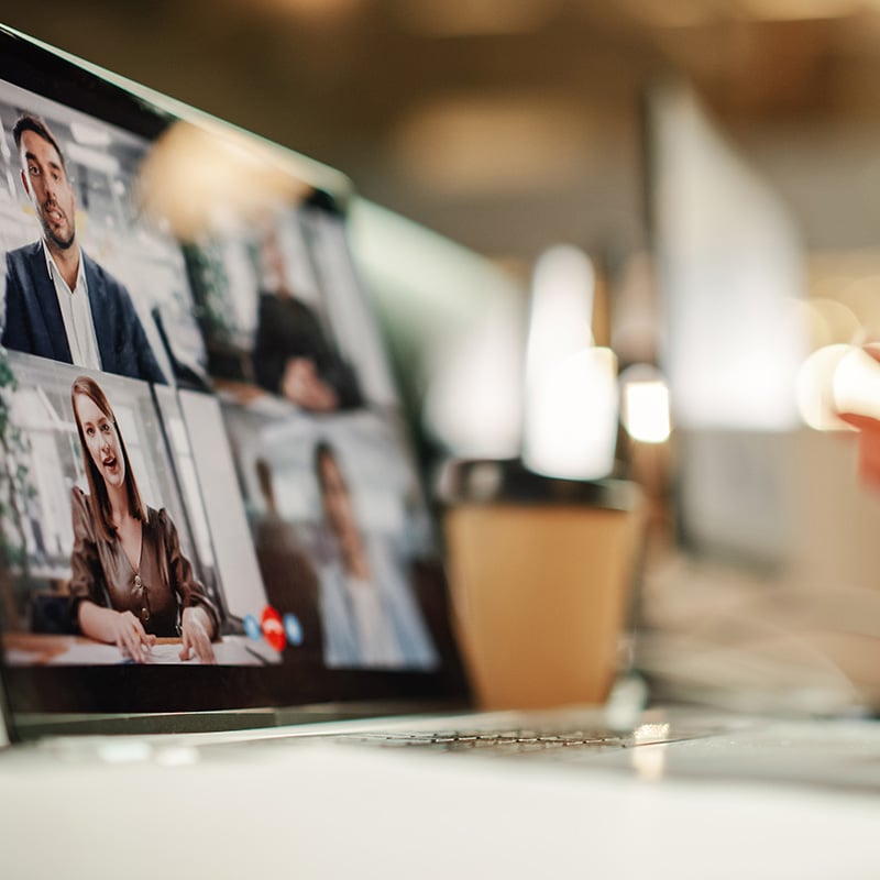 A female employee uses Azure Virtual Desktop on her laptop to securely open her work desktop, access line-of-business applications, and continue working without interruption from wherever she signs in.