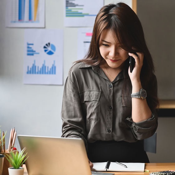 Picture of employee working remotely with line-of-business that are secured using Microsoft Defender for Cloud Apps