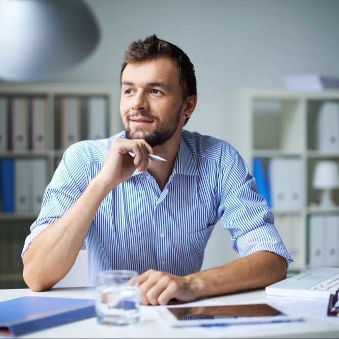 Employee confidently working knowing that all his sensitive documents are secure