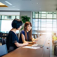 Picture of employees using SharePoint lists and libraries, Microsoft Power Automate, and Microsoft Power Apps to create a rich digital experience with forms, workflows, and custom apps 