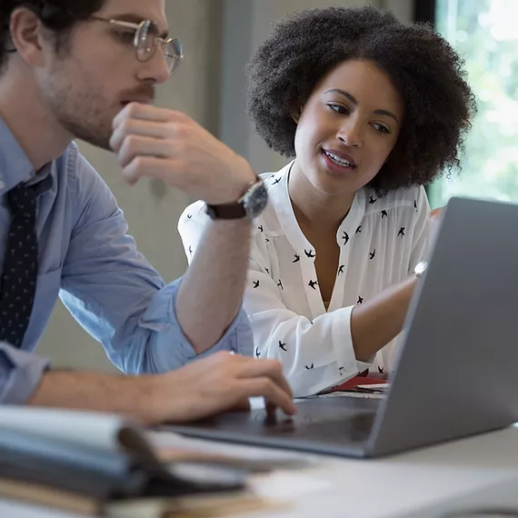 Colleagues Working in Office