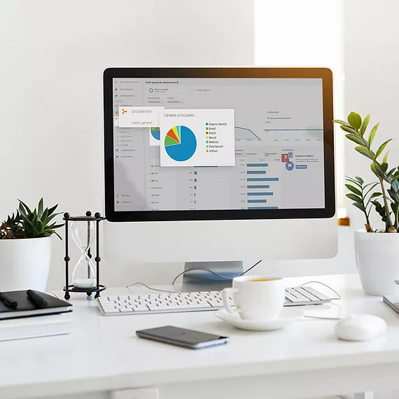 A desktop displaying Microsoft Excel with detailed graphs and charts highlights how Microsoft Intune secures and optimizes devices, ensuring reliable data analysis, system performance, and enhanced productivity.