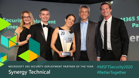 Picture of Synergy Technical holding Microsoft Security 20/20 Partner Award