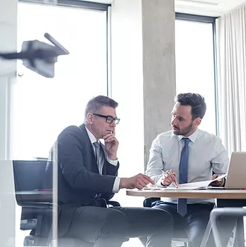 A Security IT team uses Microsoft Defender for Identity security reports to detect users and devices authenticating with clear-text passwords, helping to mitigate security risks and enforce stronger authentication practices.