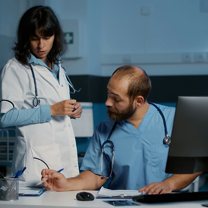 In a busy outpatient clinic, an administrator processes insurance claims smoothly because the MSP ensures reliable access to practice management software.