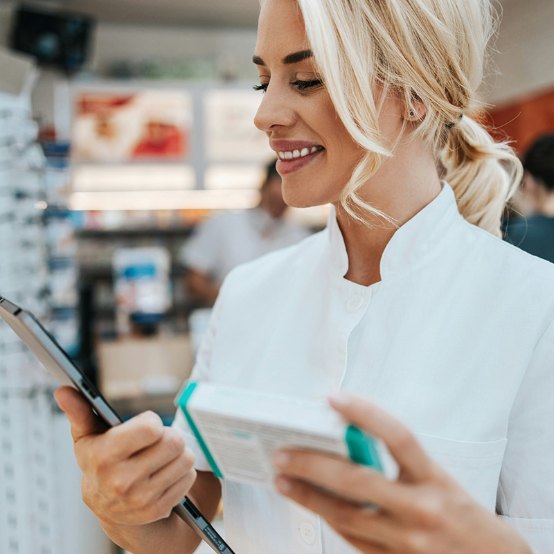 An eyewear shop employee manages inventory with accuracy, supported by managed IT services that safeguard uptime and system reliability.