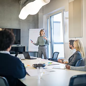 Picture of manager using SharePoint to broadcast a message and drive communication to employees