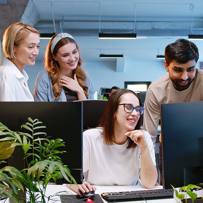 A department team reviews an AI agent built by a coworker, while Microsoft Agent 365 helps the organization bring employee-created agents into a more visible and governed environment.
