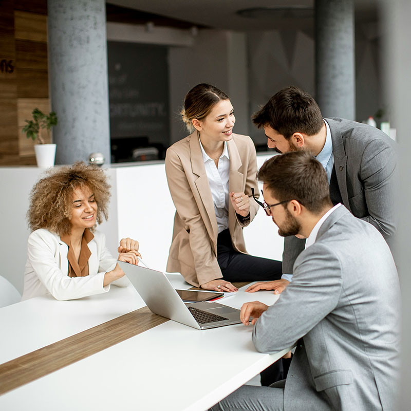 Picture of employee collaborating with the rest of her team in Microsoft Teams and using Copilot to stir inspirational ideas and information to fuel imagination. 