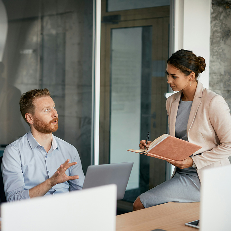 An IT security team monitors Microsoft Entra ID Protection, analyzing real-time sign-in risk alerts and automated threat detection to proactively identify and mitigate potential security breaches before they impact critical applications.
