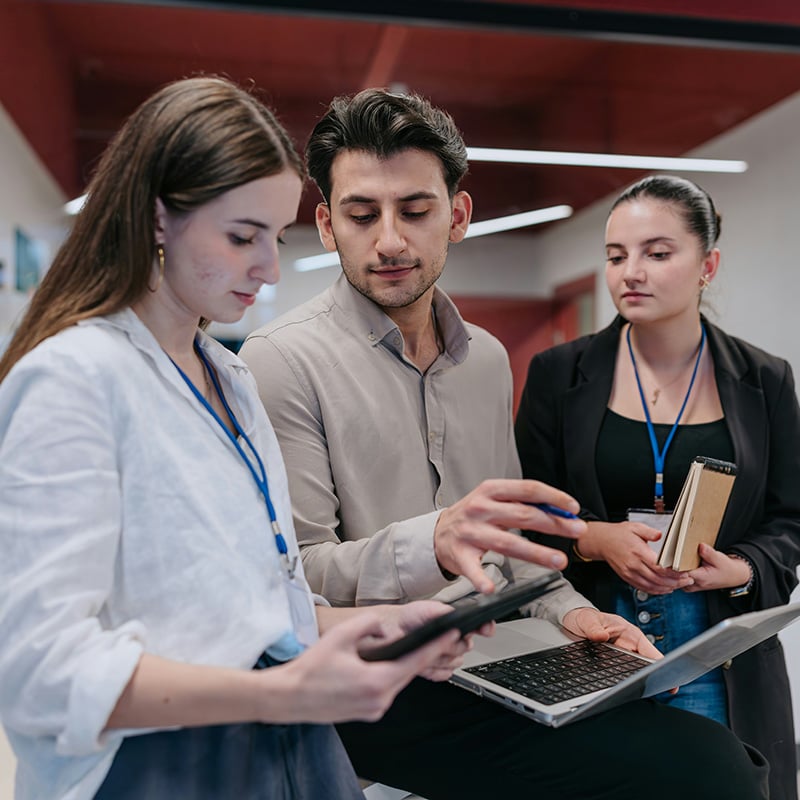 A security director and team focus on high-impact initiatives while Entra ID Protection quietly handles manual, time-consuming identity threat response tasks.