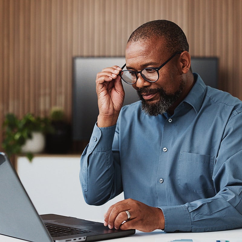 He stays focused on his work because Microsoft Intune keeps his device secure and compliant in the background.