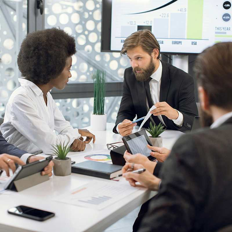 Meeting regularly, an IT security team uses Microsoft Purview’s centralized policy management to maintain consistent oversight across their data estate—streamlining enforcement and reducing governance gaps.