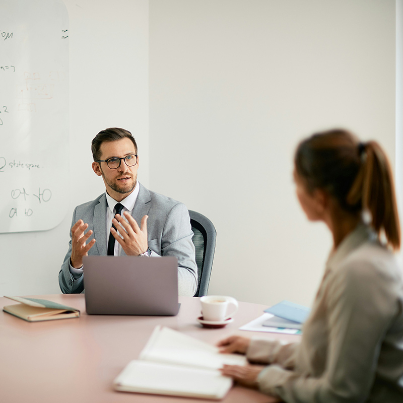 Two R&D engineers iterate on a confidential design in Teams; the Data Leakage policy template instantly checks each shared file for sensitive keywords, prompts them to apply the correct sensitivity label, and—because Insider Risk sees no anomalies—lets them keep collaborating without interruption.