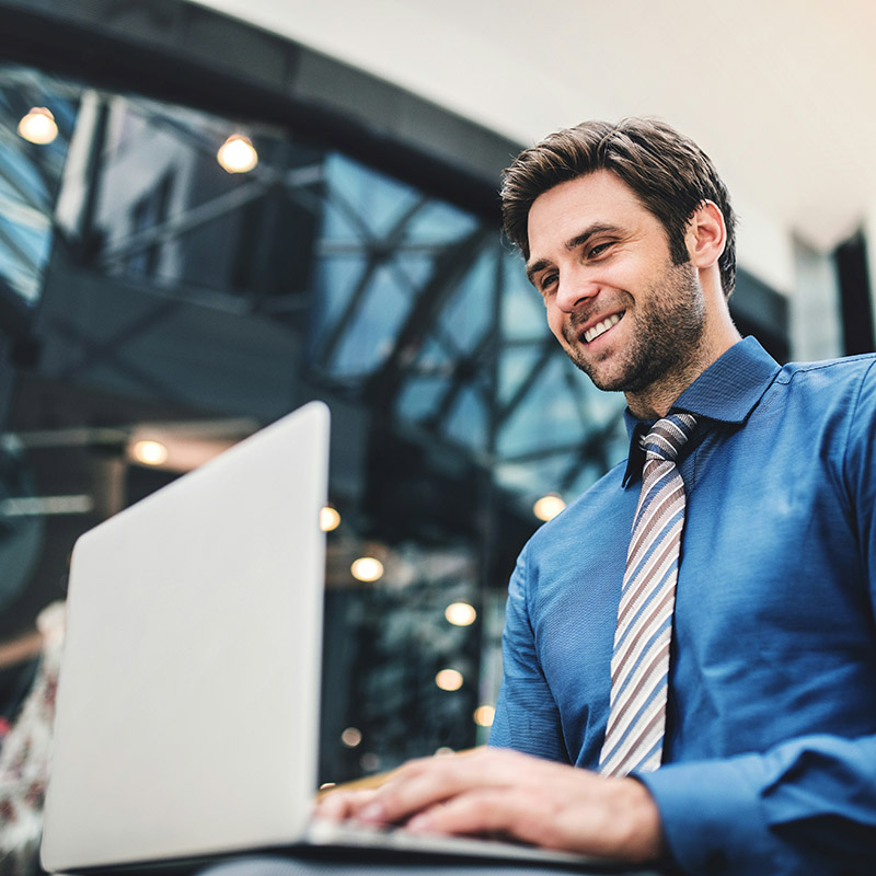 A remote employee accesses files securely from the cloud while knowing that retention policies from Purview Data Lifecycle Management are quietly managing data lifecycle in the background.