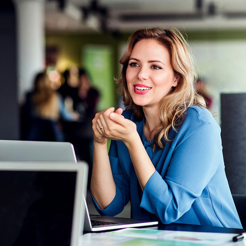 A female compliance officer conducts a content search with Purview eDiscovery, quickly locating, filtering, and preserving content across Microsoft 365 to support her compliance review.