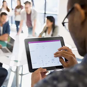 Person Holding Tablet