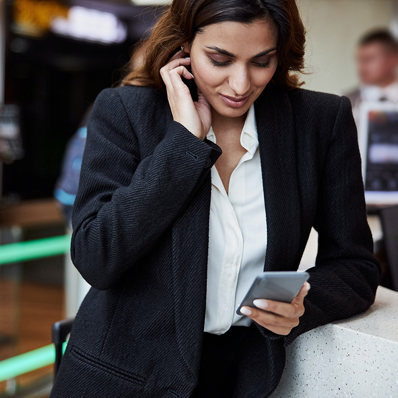 Picture of an employee multitasking & commuting to work while leveraging Power Apps for low-code, no-code custom business app development