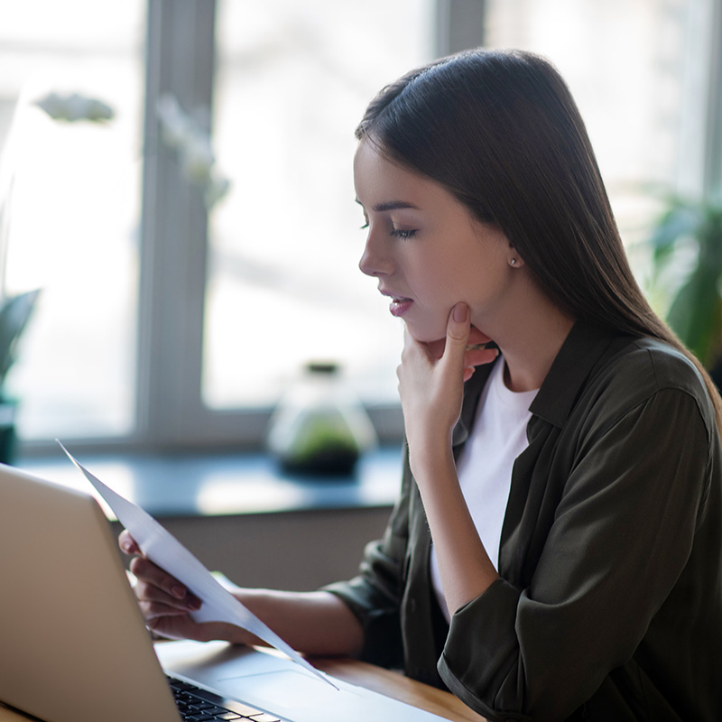 Picture of a remote employee configuring Power Platform's compliance and data privacy settings, demonstrating proactive measures for safeguarding sensitive information