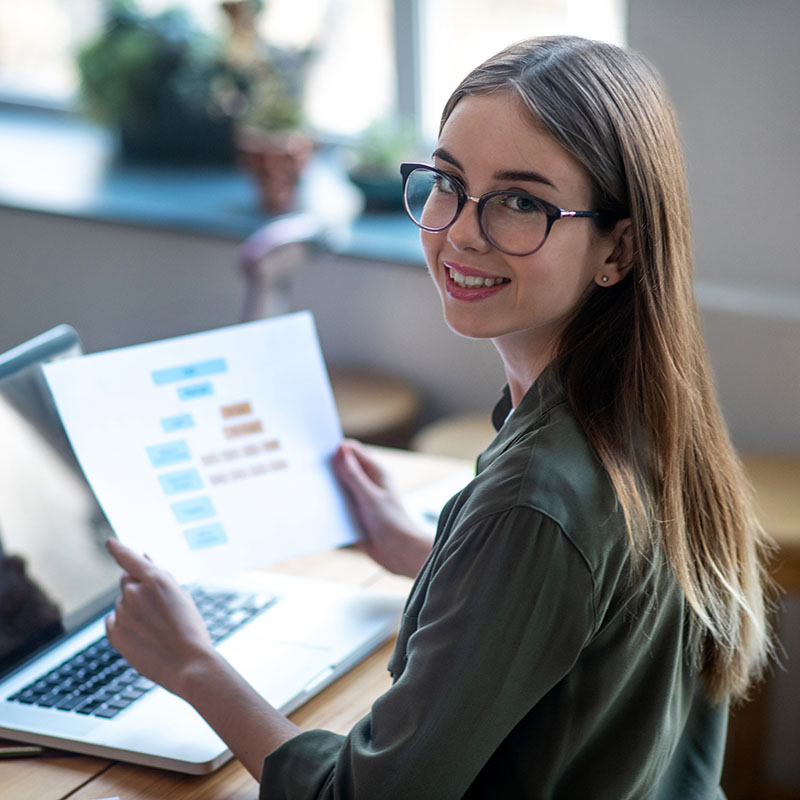 Picture of an employeee navigating Power Platform's compliance and data privacy features, ensuring robust data protection and regulatory adherence