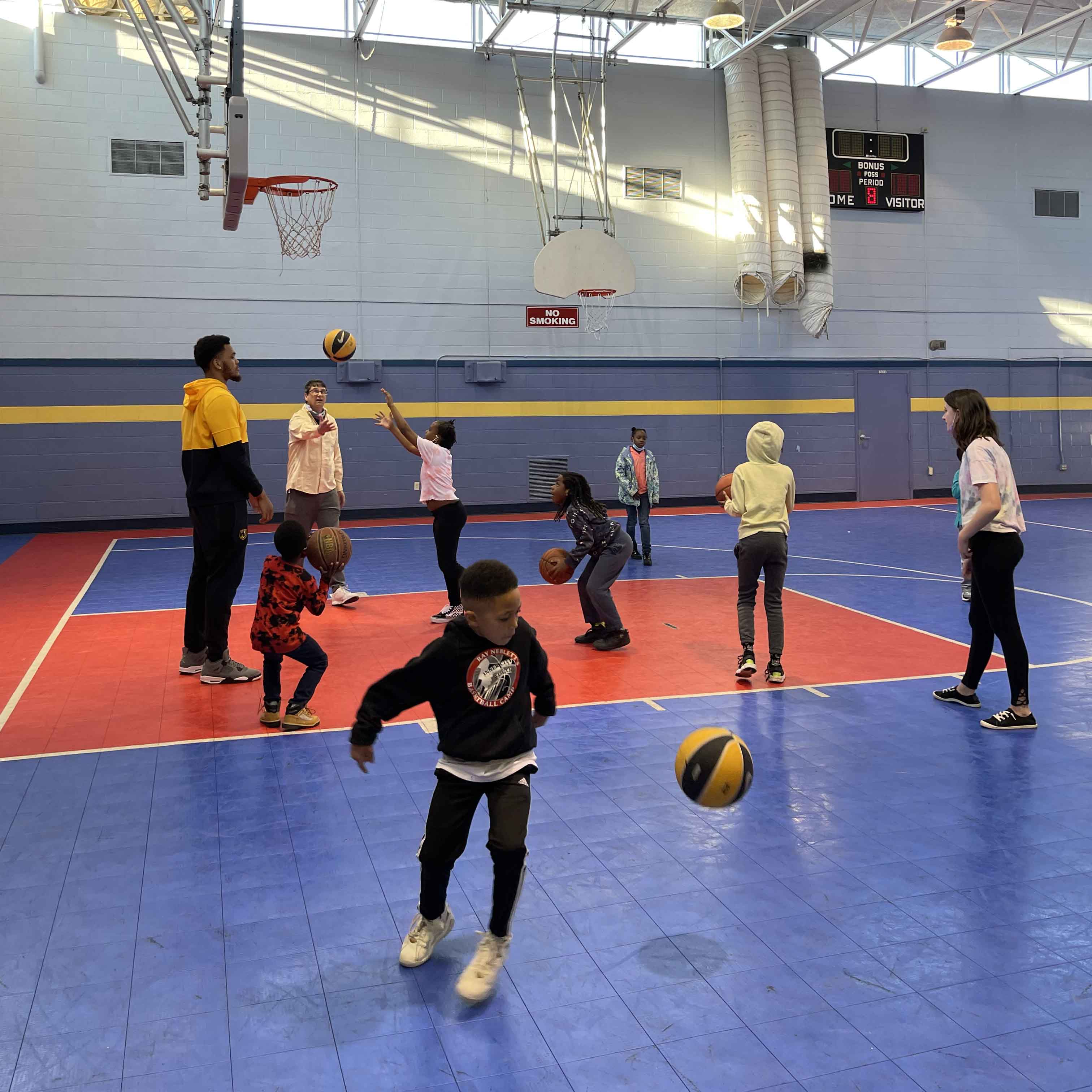 Synergy Technical partnering with a local nonprofit by spending time kids through the Community Outreach Program.