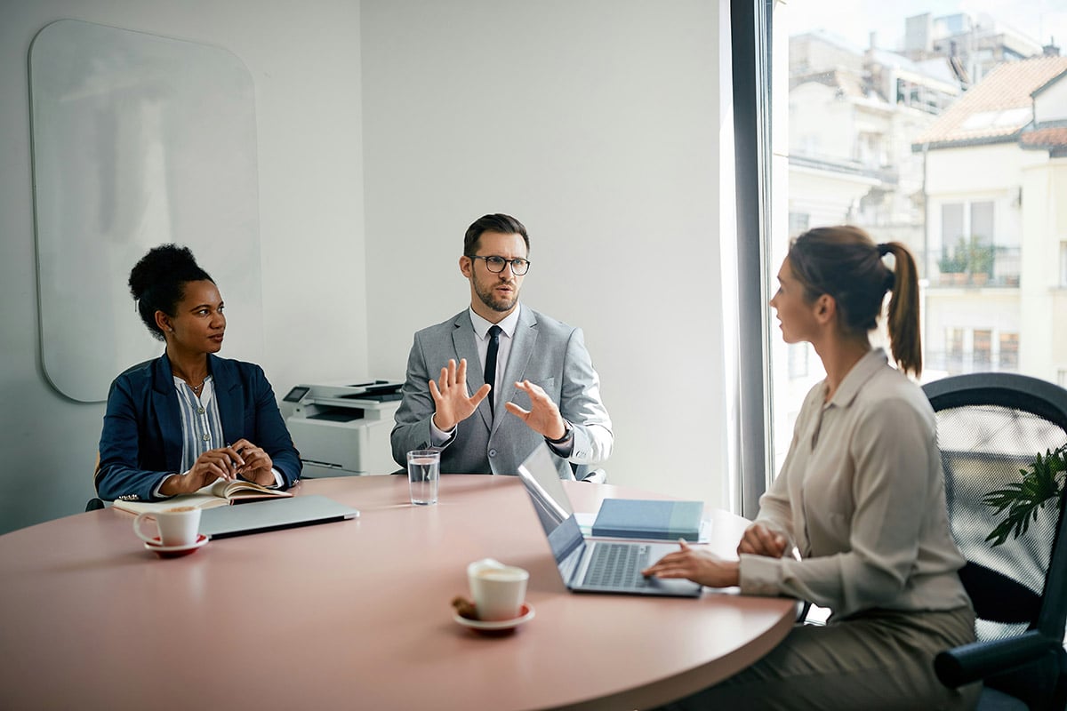 Synergy Technical's IT consulting team meeting with an organization to assess their software licensing plan to support their business.