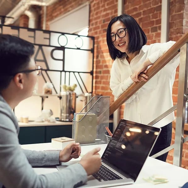 Employees collaborating on a project securely using corporate data and devices 