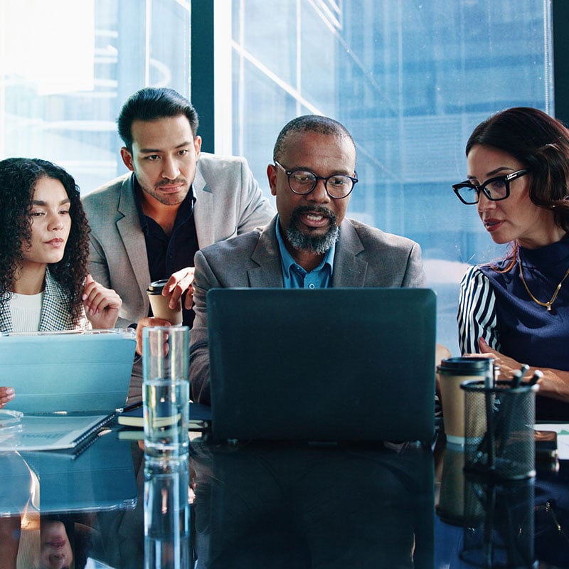 As the director walks his team through a project, Windows works in the background with built-in protections like BitLocker, Windows Hello for Business, and Microsoft Defender support to help secure the device and business data.