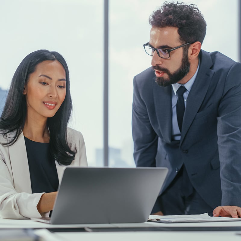 An employee uses Windows 365 to work on her laptop, making it easier to stay productive with access to her Cloud PC whether she is in the office, at home, or on the go.