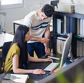 Picture of employees using Exchange Online in Microsoft 365 to send organization-wide emails about events and reminders